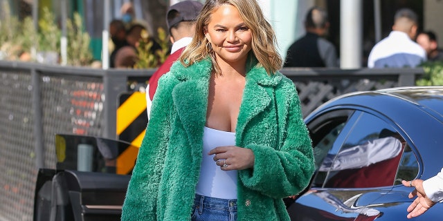 Chrissy Teigen is spotted on Dec. 17, 2021, in Los Angeles, California. This year, the "Cravings" cookbook author saw her image nearly implode after the former swimsuit model was outed for sending abhorrent messages to others on social media.