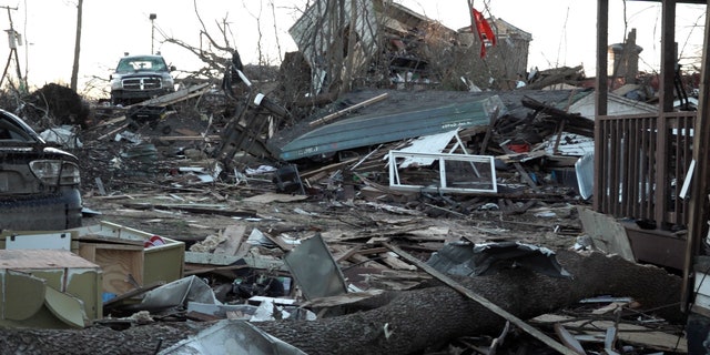 Mayfield, Kentucky following deadly tornadoes in the South and Midwest that left a trail of devastation to affected families and communities.
