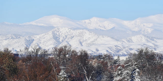 Photo taken snow covered City Park and front range at the park in Denver, Colorado on Tuesday, April 20, 2021. The Rocky Mountains got much-needed snow before Christmas. (Photo by Hyoung Chang/MediaNews Group/The Denver Post via Getty Images)