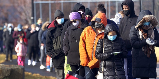 Long COVID testing lines at Rivergreen Park in Everett, Mass., Dec. 28, 2021. 