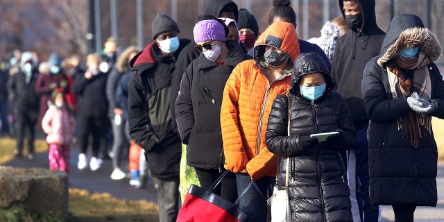 Long COVID testing lines at Rivergreen Park in Everett, Mass., Dec. 28, 2021. 