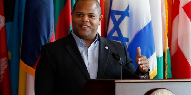 This April 22, 2020, file photo shows Dallas Mayor Eric Johnson responding to a question during a news conference at City Hall in Dallas. Johnson has formed a committee to investigate why a police officer remained on active duty for more than a year and a half after he was implicated in two 2017 killings. 