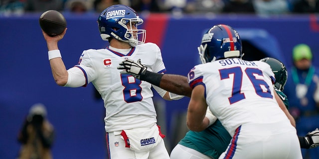 New York Giants quarterback Daniel Jones throws under pressure during the first half of a game against the Philadelphia Eagles Nov. 28, 2021, in East Rutherford, N.J.
