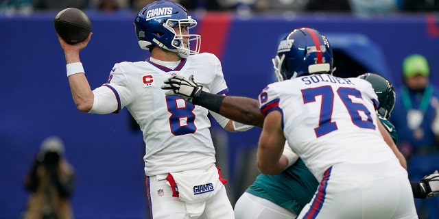 New York Giants quarterback Daniel Jones throws under pressure during the first half of a game against the Philadelphia Eagles Nov. 28, 2021, in East Rutherford, N.J.