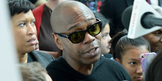 WASHINGTON, DC - SEPTEMBER 29:  Dave Chappelle takes questions from local press during a visit to his alma mater, the Duke Ellington School of the Arts on September 29, 2017 in Washington, DC.  (Photo by Shannon Finney/Getty Images)