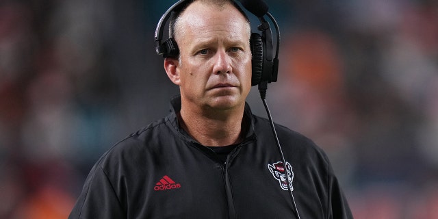 Head coach Dave Doeren of the North Carolina State Wolfpack looks on during the game against the Miami Hurricanes in the first half at Hard Rock Stadium on Oct. 23, 2021, in Miami Gardens, Florida.