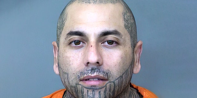David Gutierrez is accused of robbing two Cricket Wireless stores and two T-Mobile stores in Phoenix, Ariz.