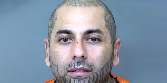 David Gutierrez is accused of robbing two Cricket Wireless stores and two T-Mobile stores in Phoenix, Ariz.