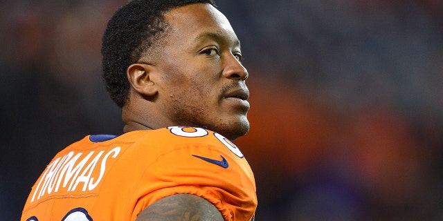 Demaryius Thomas looks on as players warm up on the field before a game at Sports Authority Field at Mile High on November 12, 2017 in Denver, Colorado.