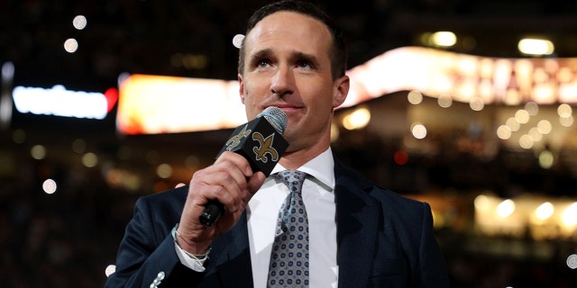 Former Saints quarterback Drew Brees speaks to the fans during halftime of the game between the Buffalo Bills and the Saints at Caesars Superdome on Nov. 25, 2021, in New Orleans, Louisiana.