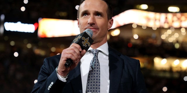 Former Saints quarterback Drew Brees speaks to the fans during halftime of the game between the Buffalo Bills and the Saints at Caesars Superdome on Nov. 25, 2021, in New Orleans, Louisiana.