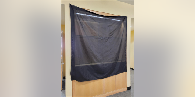 The empty display case that had previously held the "holiday reading display" at the Dolley Madison Library. 