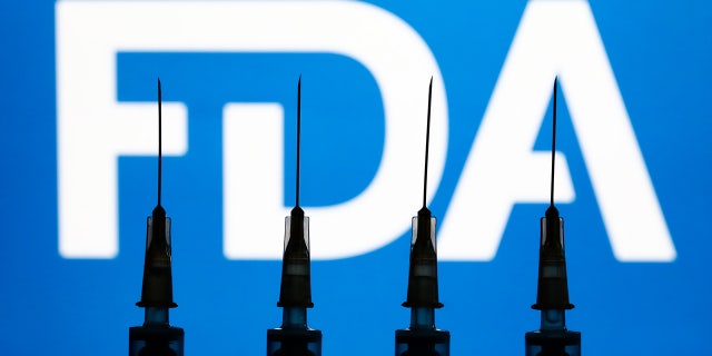 FDA Faces Legal Challenge Over COVID-19 Approval Data, Report Says