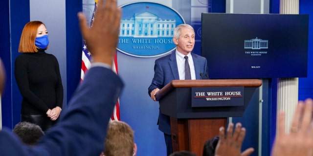 Dr. Anthony Fauci, director of the National Institute of Allergy and Infectious Diseases, speaks during the daily briefing at the White House in Washington, Wednesday, Dec. 1, 2021, as White House press secretary Jen Psaki watches. 