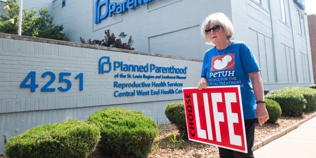 Anti-abortion demonstrators hold a protest outside the Planned Parenthood Reproductive Health Services Center in St. Louis, Missouri, May 31, 2019, the last location in the state performing abortions. SAUL LOEB/AFP via Getty Images)