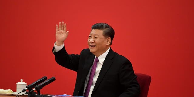 Chinese President Xi Jinping speaks from the Great Hall of the People.