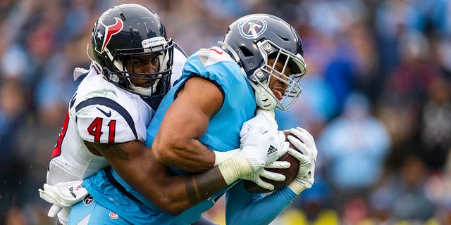 Zach Cunningham (41) of the Houston Texans tackles Khari Blasingame of the Tennessee Titans short of the goal line during the third quarter at Nissan Stadium on Dec. 15, 2019 in Nashville, Tenn.