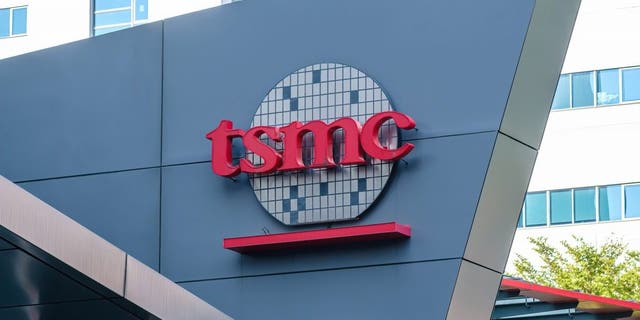 The TSMC logo seen on the Taiwanese semiconductor contract manufacturing and design company building in Hsinchu. 