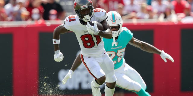 Tampa Bay Buccaneers wide receiver Antonio Brown (81) makes a catch and goes the distance for a score during a game against the Miami Dolphins Oct. 10, 2021, at Raymond James Stadium in Tampa, Fla. 