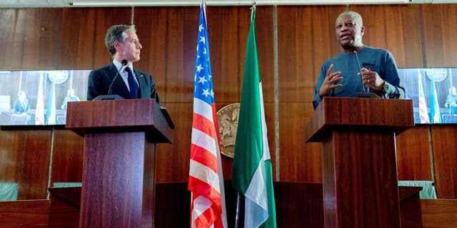 Nigerian Foreign Minister Geoffrey Onyeama (R) speaks during a meeting with US Secretary of State Antony Blinken (L) at the Aso Rock Presidential Villa in Abuja, Nigeria, on November 18, 2021. - Blinken is on a five day trip to Kenya, Nigeria, and Senegal. (Photo by Andrew Harnik / POOL / AFP) (Photo by ANDREW HARNIK/POOL/AFP via Getty Images)
