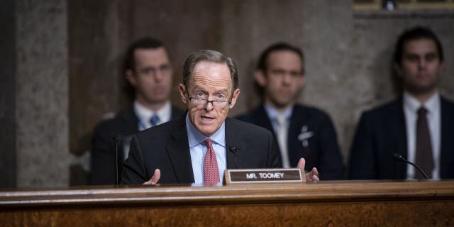 Sen. Pat Toomey, a Republican from Pennsylvania and ranking member of the Senate Banking, Housing, and Urban Affairs Committee, speaks during a hearing in Washington, D.C., Nov. 30, 2021.