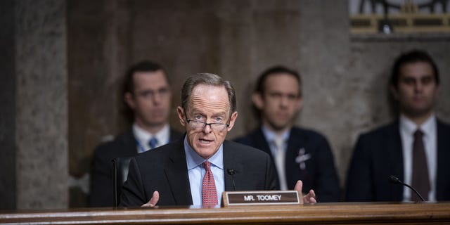 Sen. Pat Toomey, a Republican from Pennsylvania and ranking member of the Senate Banking, Housing, and Urban Affairs Committee, speaks during a hearing in Washington, D.C., on Tuesday, Nov. 30, 2021. 