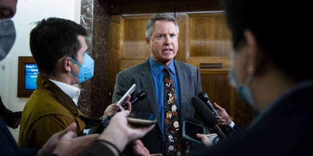 Sen. Roger Marshall speaks to members of the media during a Senate Energy and Natural Resources Committee hearing on Capitol Hill on Dec. 2, 2021.