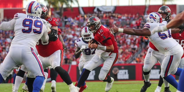 Buccaneers quarterback Tom Brady runs for a first down against the Buffalo Bills  on Dec. 12, 2021, at Raymond James Stadium in Tampa, Florida. 