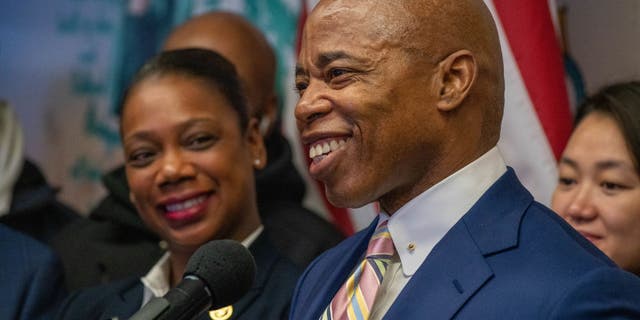 New York City Mayor-elect Eric Adams announces Keechant Sewell as his pick for the New York Police Departments police commissioner at a press conference on December 15, 2021 in the Queens borough of New York City. Sewell a 22-year veteran of the force and a once member of the hostage negotiations team steps down from her position as chief of detectives in Nassau County to become the NYPD's first woman police commissioner.