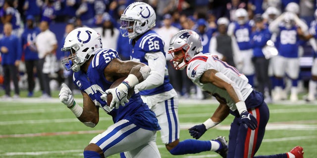 Colts outside linebacker Darius Leonard (53) intercepts a pass from New England Patriots quarterback Mac Jones (10) in the second quarter. The Indianapolis Colts host the New England Patriots on Dec. 18, 2021 in a Saturday night NFL game at Lucas Oil Stadium in Indianapolis, Indiana. 