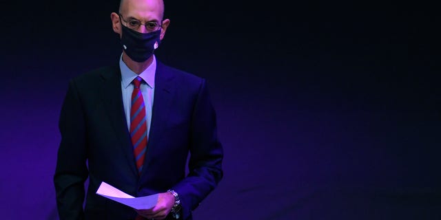 NBA Commissioner Adam Silver waits to speak at the Los Angeles Lakers championship ring ceremony before the season-opening game against the LA Clippers at Staples Center Dec. 22, 2020 in Los Angeles. 