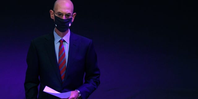 NBA Commissioner Adam Silver waits to speak at the Los Angeles Lakers championship ring ceremony before the season-opening game against the LA Clippers at Staples Center Dec. 22, 2020 in Los Angeles.
