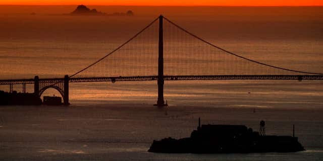 End of day as the sun sets with the Farallon Islands, Golden Gate Bridge and Alcatraz island, seen from the Oakland hills , Calif., on Tuesday Feb. 6, 2018. (Photo By Michael Macor/The San Francisco Chronicle via Getty Images)