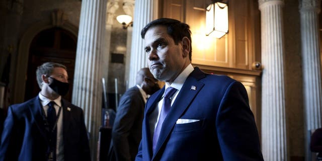 Sy. Marco Rubio arrives to a luncheon with Senate Republicans at the Capitol.