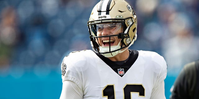 Ian Book of the New Orleans Saints warms up before a game against the Tennessee Titans at Nissan Stadium on Nov. 14, 2021 in Nashville.
