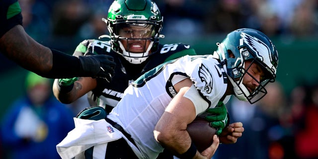 Gardner Minshew runs the ball during the first half against the New York Jets at MetLife Stadium on December 05, 2021 in East Rutherford, New Jersey. 