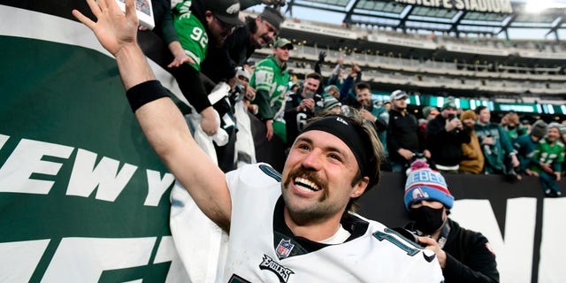 EAST RUTHERFORD, NEW JERSEY - DECEMBER 05: Gardner Minshew #10 of the Philadelphia Eagles celebrates as he runs off the field after defeating the New York Jets 33-18 at MetLife Stadium on December 05, 2021 in East Rutherford, New Jersey. 