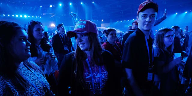 People attend Turning Point USA’s America Fest 2021, a gathering of conservative’s and Donald Trump supporters, on Dec. 18, 2021 in Phoenix, Arizona.