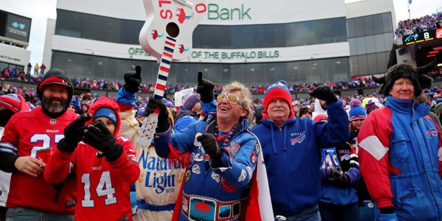 Buffalo Bills fans celebrate a touchdown in the third quarter of the game against the Carolina Panthers at Highmark Stadium on Dec. 19, 2021 in Orchard Park, New York.