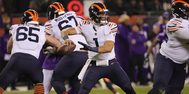 Justin Fields of the Bears looks to pass against the Minnesota Vikings at Soldier Field on Dec. 20, 2021, in Chicago, Illinois. 