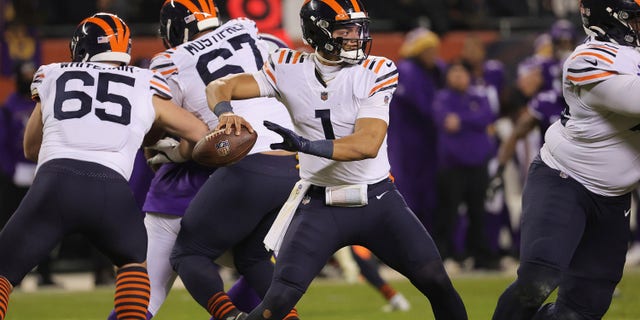 Justin Fields of the Bears looks to pass against the Minnesota Vikings at Soldier Field on Dec. 20, 2021, in Chicago, Illinois.