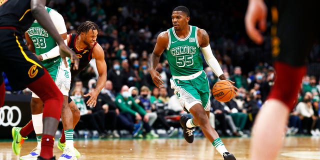 Joe Johnson #55 of the Boston Celtics brings the ball up court during the fourth quarter of the game against the Cleveland Cavaliers at TD Garden on Dec. 22, 2021 in Boston, Massachusetts.