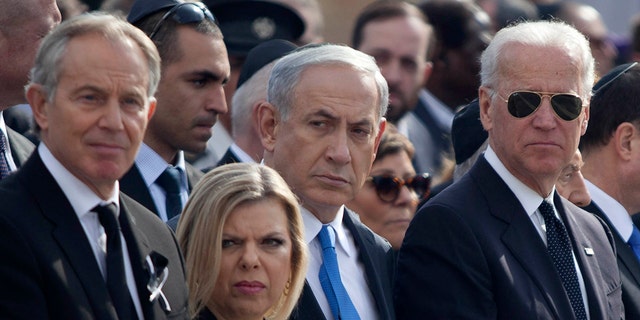 Then-US Vice President Joe Biden, right, and Israeli Prime Minister Benjamin Netanyahu and his wife Sara, center, and Former British Prime Minister Tony Blair, left, during a state memorial service for Israel's former Prime Minister Ariel Sharon at Israel's parliament, the Knesset on Jan. 13, 2014, in Jerusalem.
