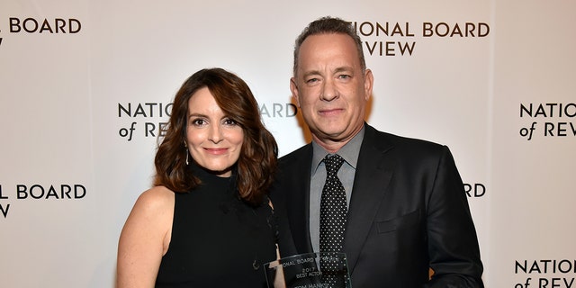 Tina Fey and Tom Hanks are seen in New York City, Jan. 9, 2018. The two supported guest host Paul Rudd during a scaled-down show Saturday. 