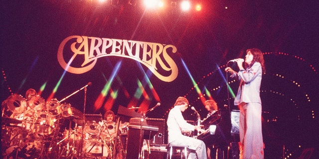 The Carpenters perform on stage at Nippon Budokan, Tokyo, Japan. Circa 1974.