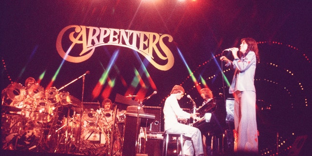 The Carpenters perform on stage at Nippon Budokan, Tokyo, Japan. Circa 1974.
