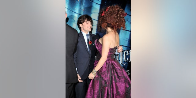 Actor Daniel Radcliffe (L) and actress Helena Bonham Carter attend the world premiere of ‘Harry Potter and The Deathly Hallows’ at Odeon Leicester Square on November 11, 2010, in London, England.