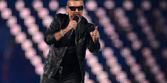 British singer George Michael performs at the Olympic stadium during the closing ceremony of the 2012 London Olympic Games in London on August 12, 2012.
