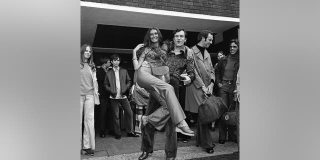 Hugh Hefner at Heathrow Airport in 1971. He was met by Marilyn Cole.