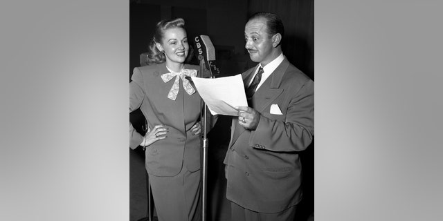 Betty Rhodes and Mel Blanc entertaining listeners on the radio, circa 1946.